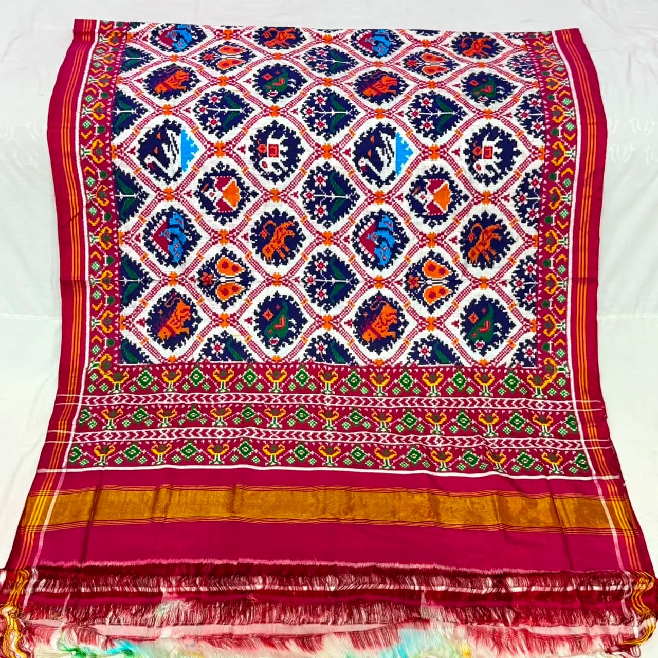 Pristine White & Crimson Ogee Jaal Double Ikat Patola Silk Saree